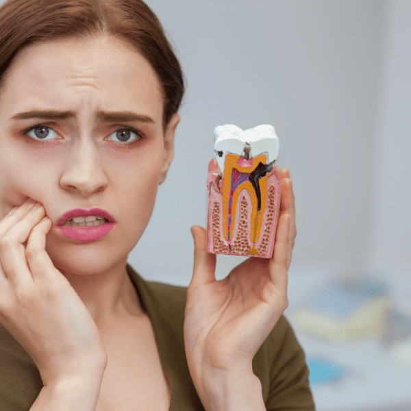 close up of female patient with toothache