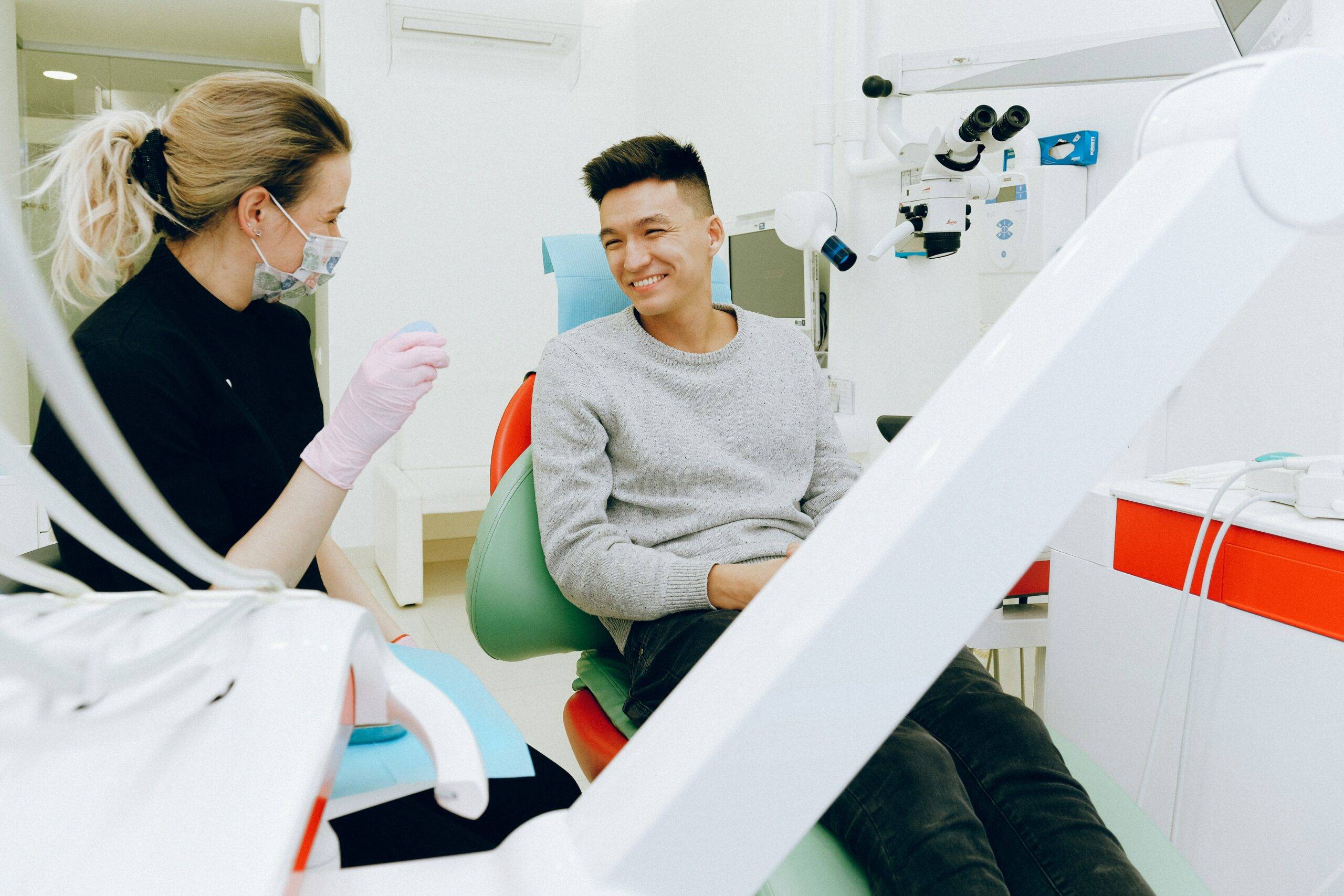 Man smiling in dentist chair